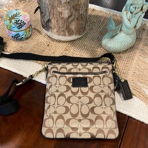 New Coach Cross Body Purse, 8.5 x 7.5 in. strap opening 22 in. Leather accents